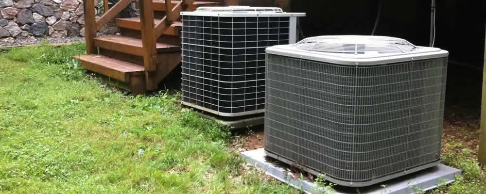 Heat pump installation and service units outside a home in Denver, CO